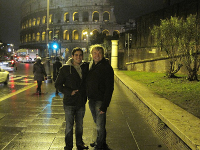 Tom and Albert standing in front of the Coliseum in Rome